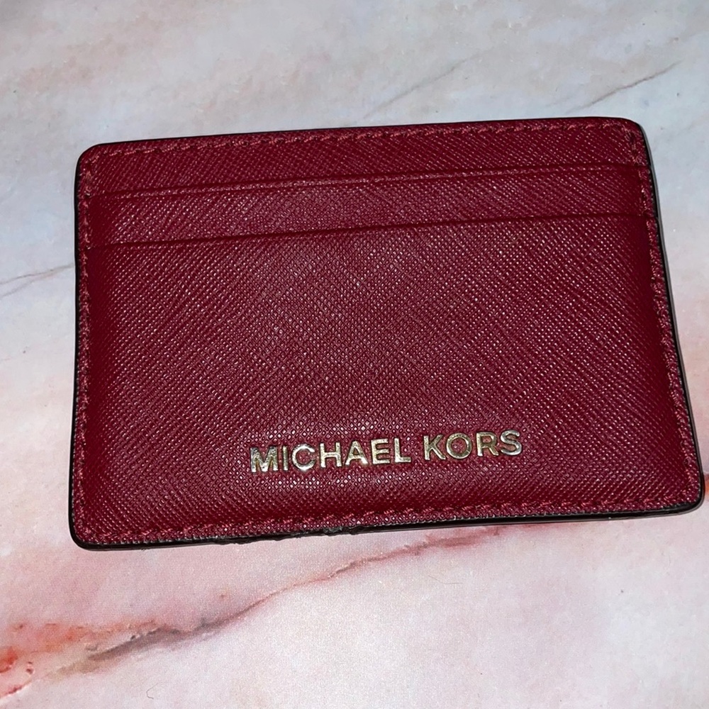Michael Kors leather dark berry jet set card holder.